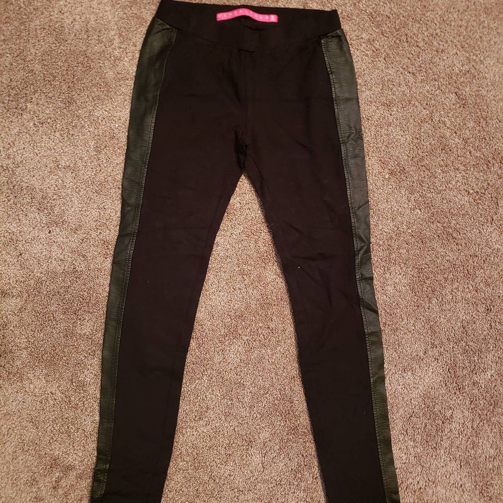 Black trimmed with leather stretch pants